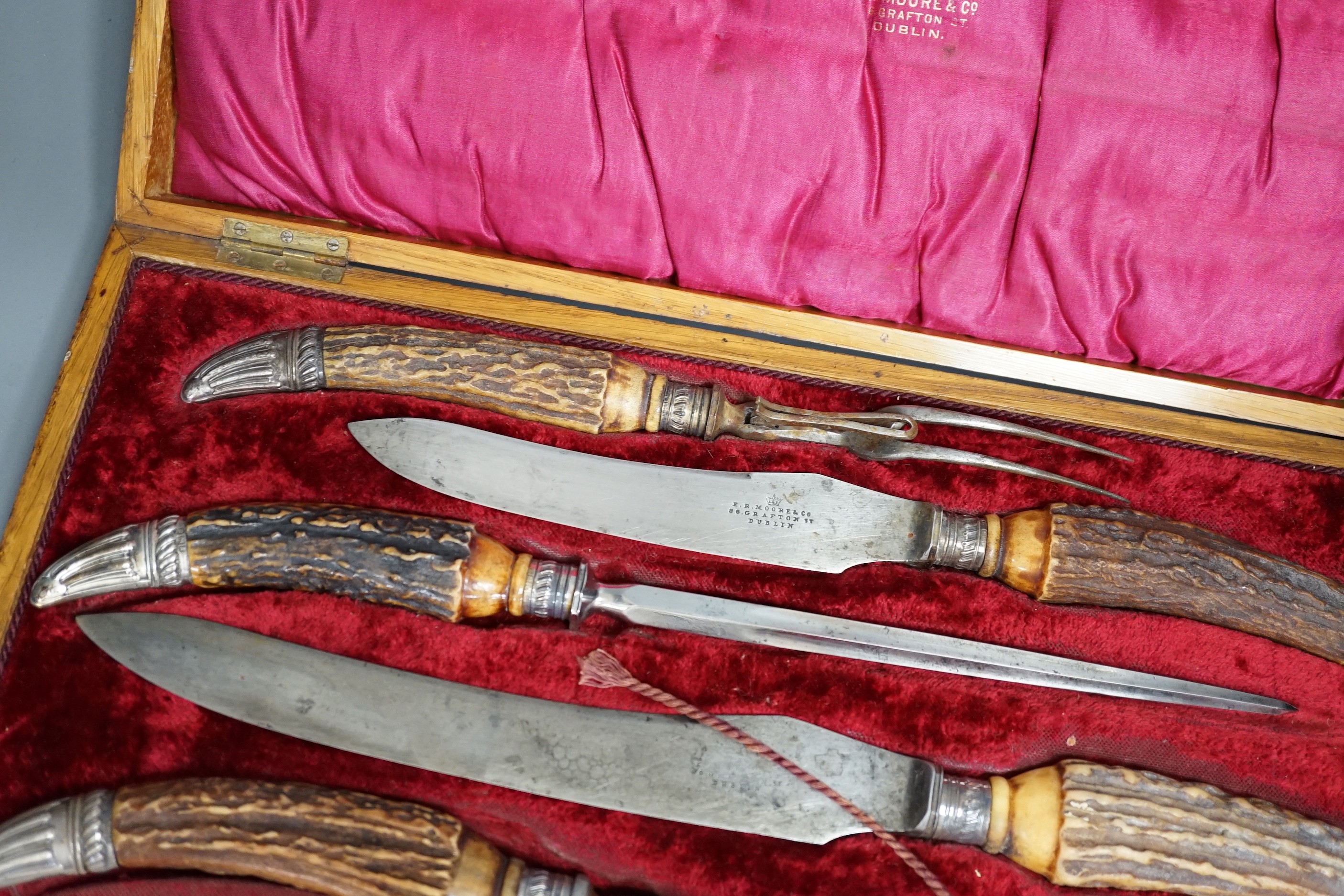 A Victorian E.R. Moore & Co. cased horn handled five piece carving set